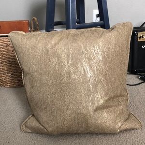 Gold throw pillow
